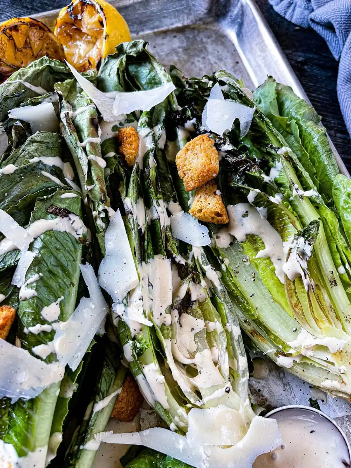 Grilled caesar salad with parmesan shavings and croutons