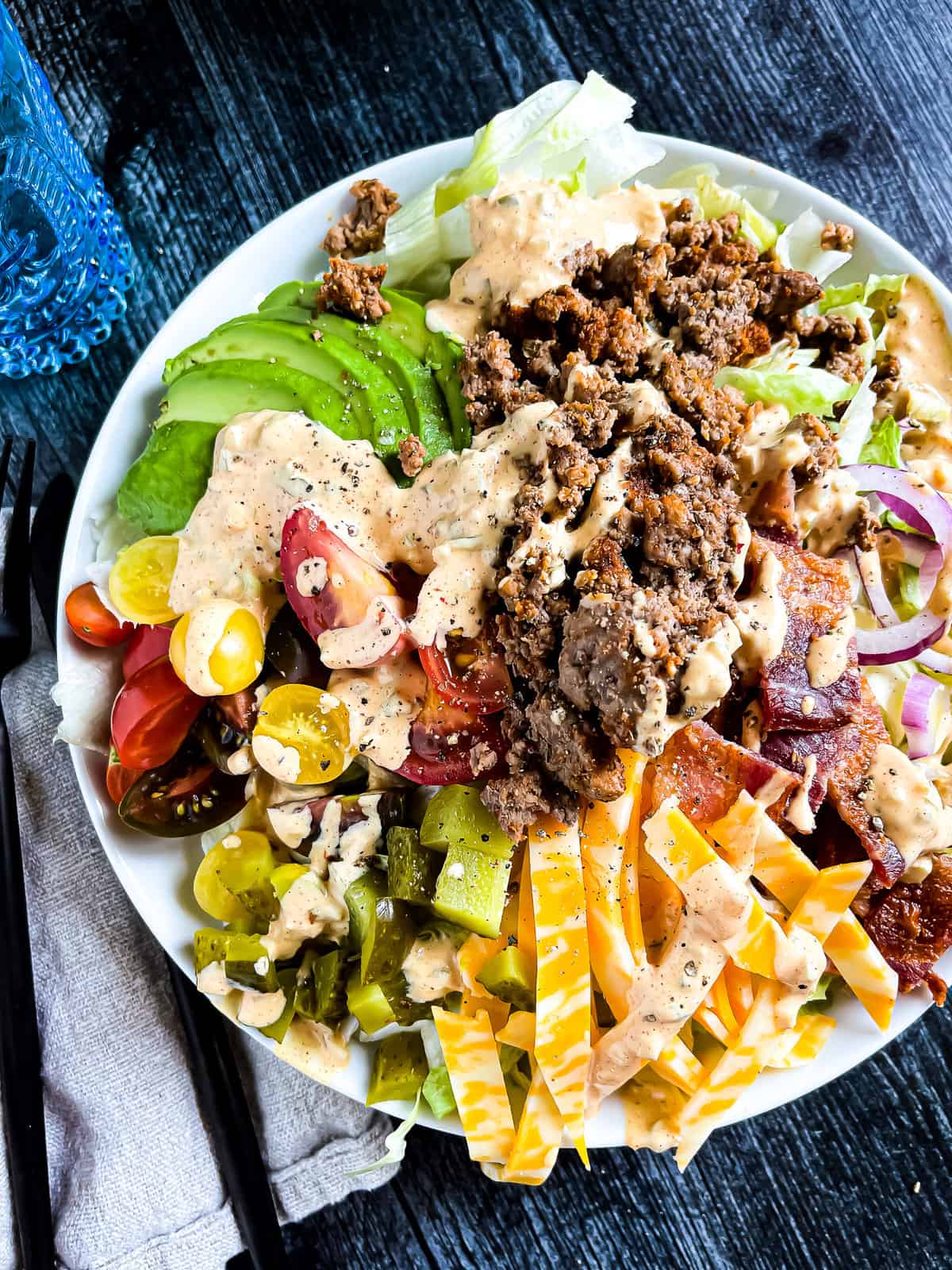 burger bowl with veggies, cheese, beef, and special sauce