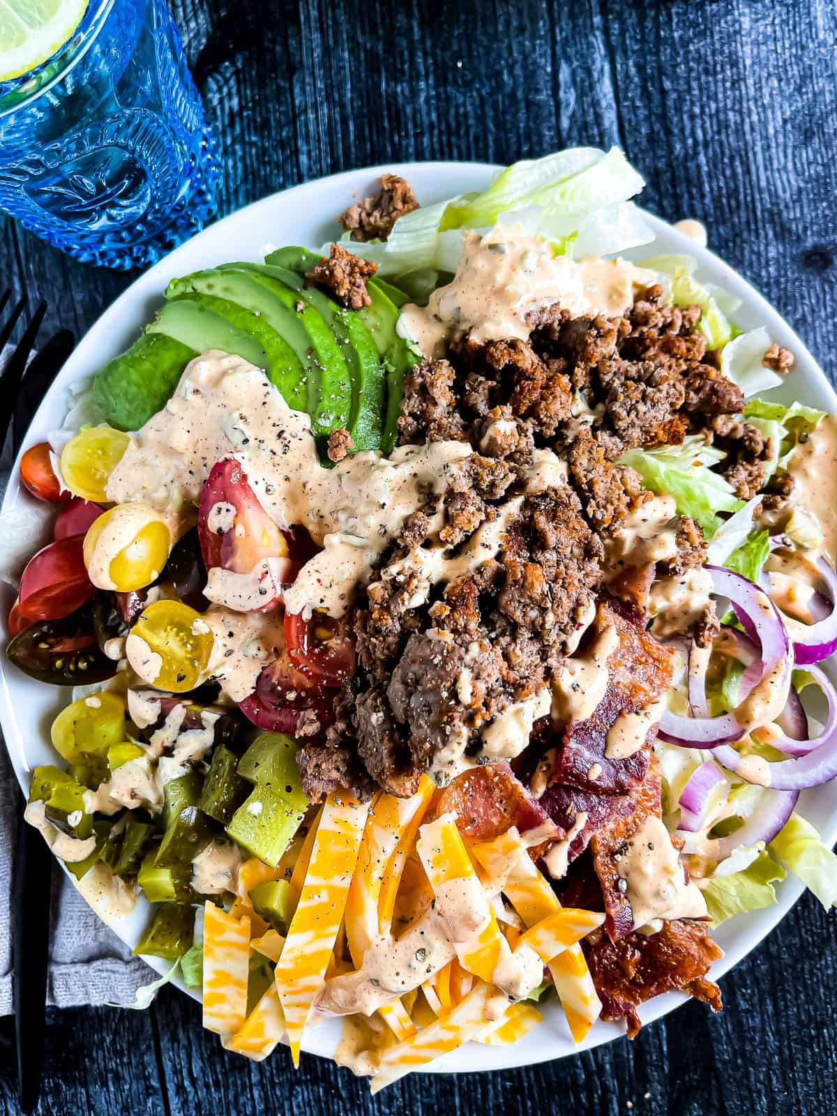 Bacon cheeseburger bowl with all the fixings and burger sauce