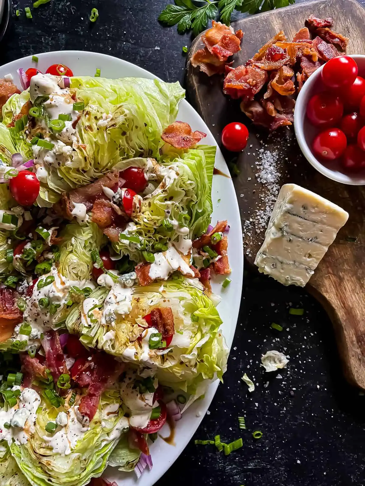 wedge salad with blue cheese, bacon, and tomatoes